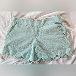 Lilly Pulitzer size 2 shorts looks to be a 4 1/2 inch inseam, scalloped hem